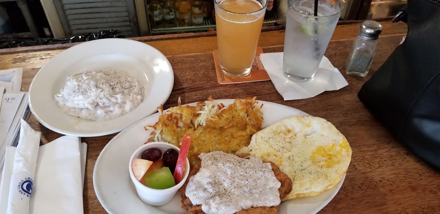 Breakfast plate and drinks at a Grand Avenue Bar & Grill bar seat